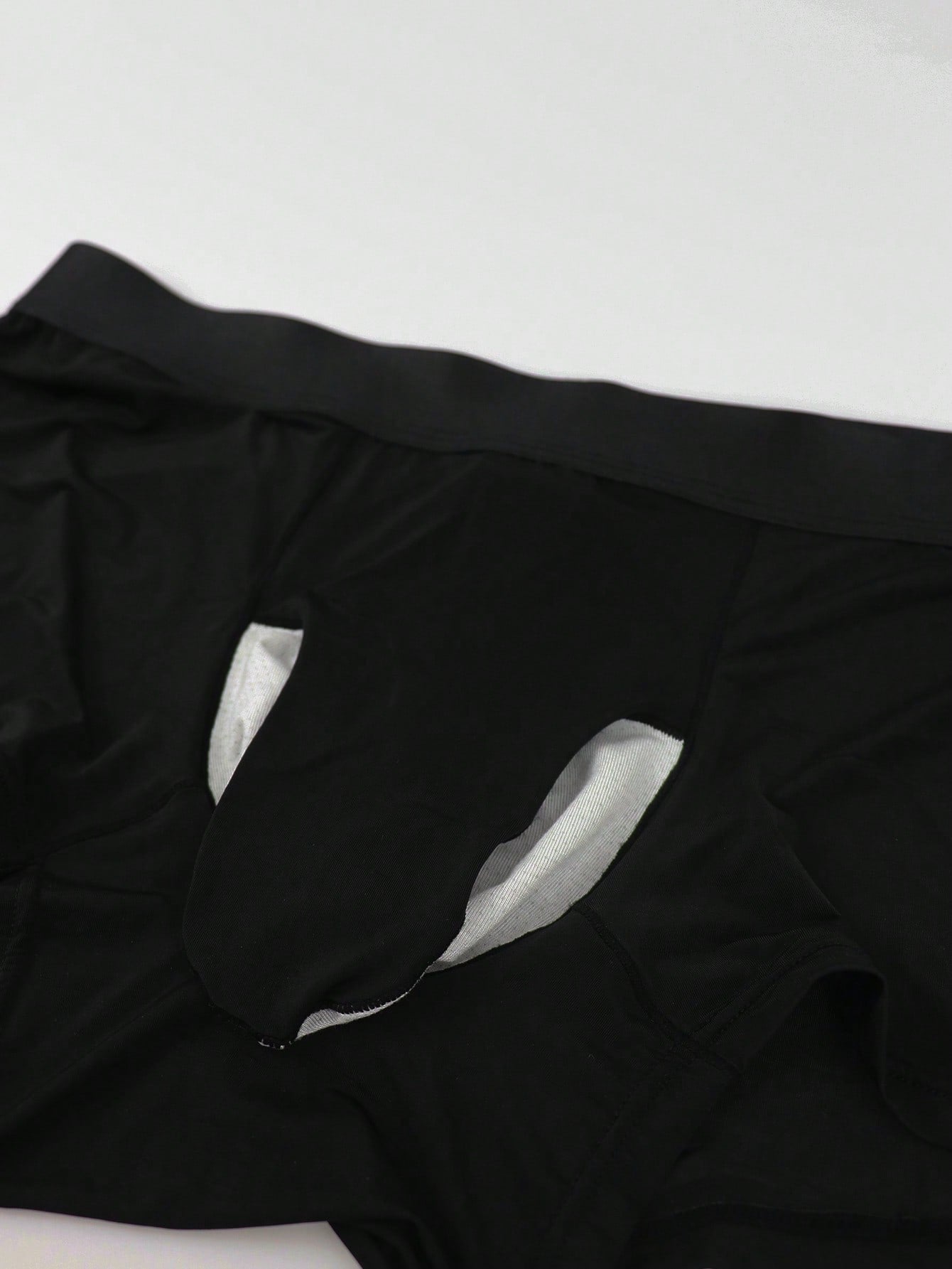 Men's patchwork casual low-rise boxer shorts in a plain style with medium-stretch knitted fabric.