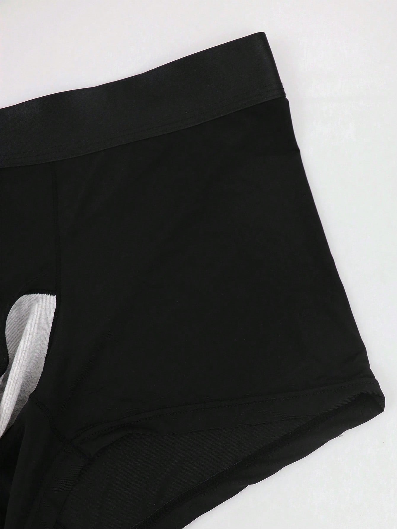 Men's patchwork casual low-rise boxer shorts in a plain style with medium-stretch knitted fabric.