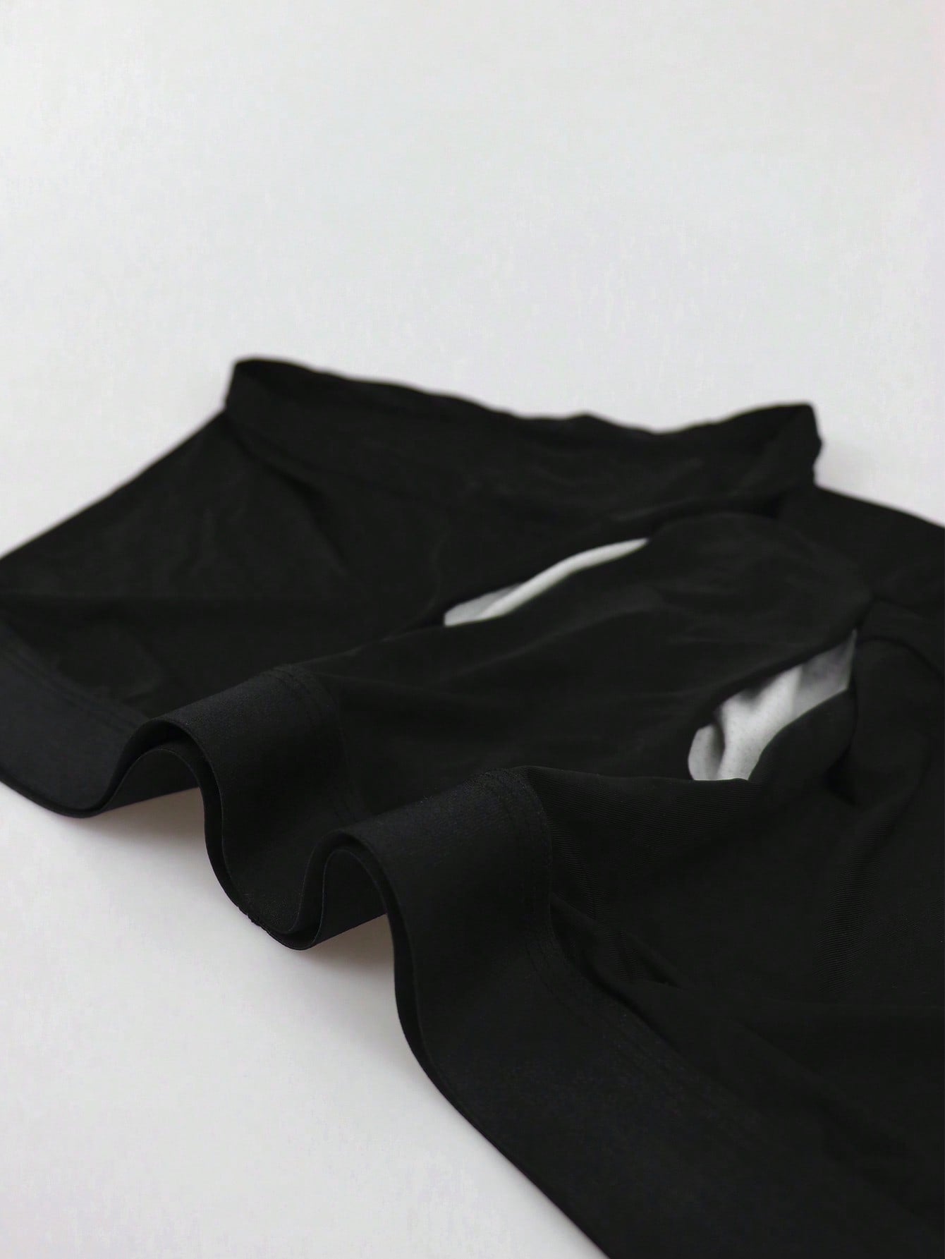 Men's patchwork casual low-rise boxer shorts in a plain style with medium-stretch knitted fabric.