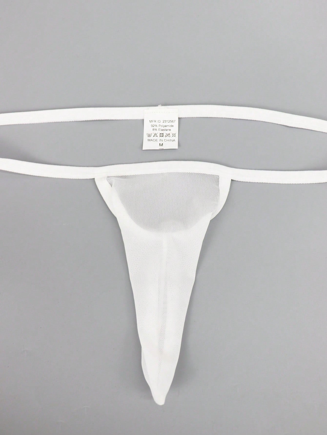 Men's mid-rise mesh jockstrap brief with a plain design and medium-stretch fabric