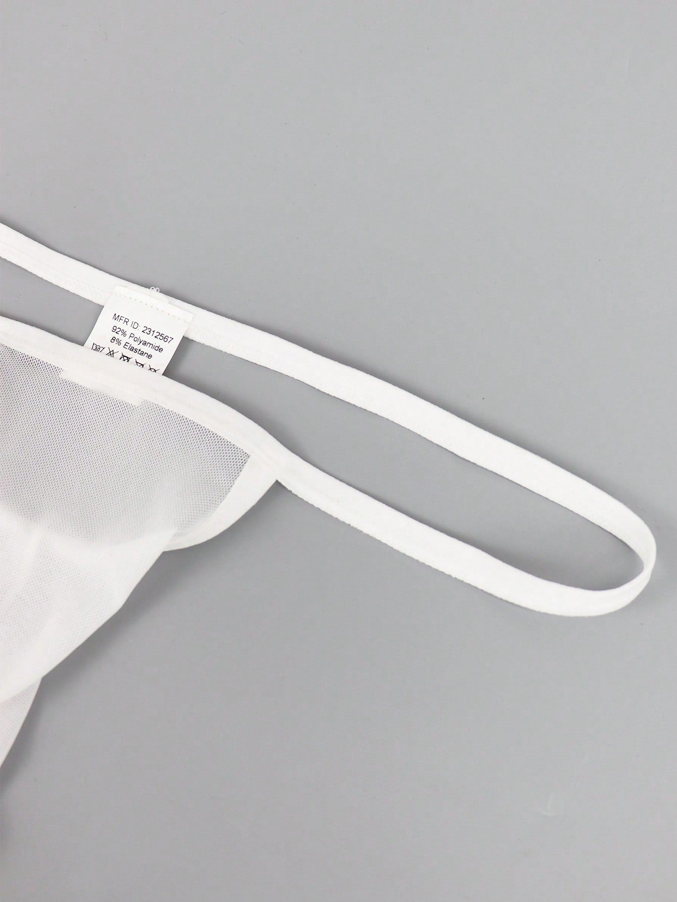 Men's mid-rise mesh jockstrap brief with a plain design and medium-stretch fabric