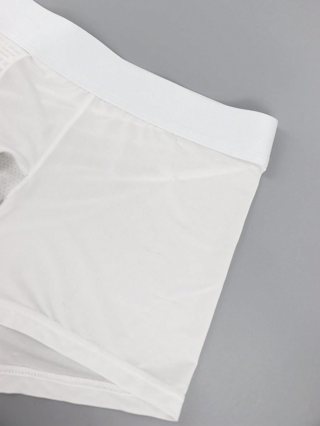 Men's patchwork casual low-rise boxer shorts in a plain style with medium-stretch knitted fabric.