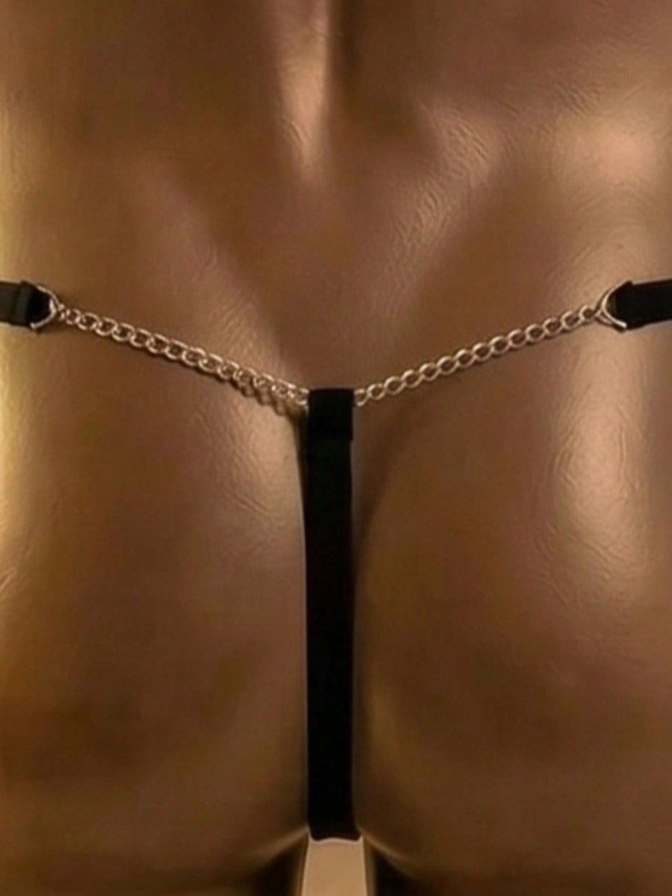 Men's black mesh low-rise thong with chain detailing