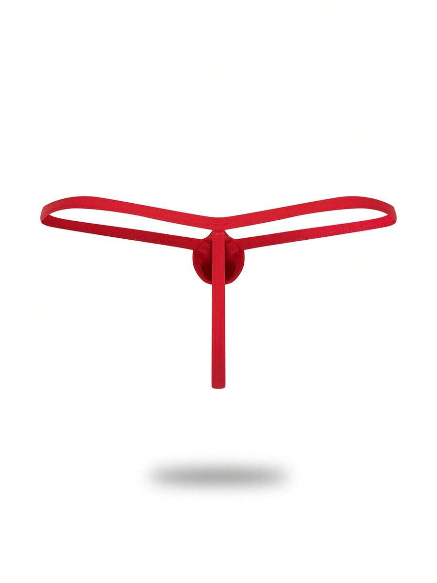 Men's red colorblock low-rise thong underwear made from medium-stretch knitted fabric.
