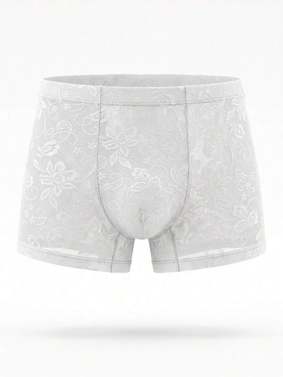 Men's white low rise mesh boxer briefs featuring a plant pattern and rib-knit details