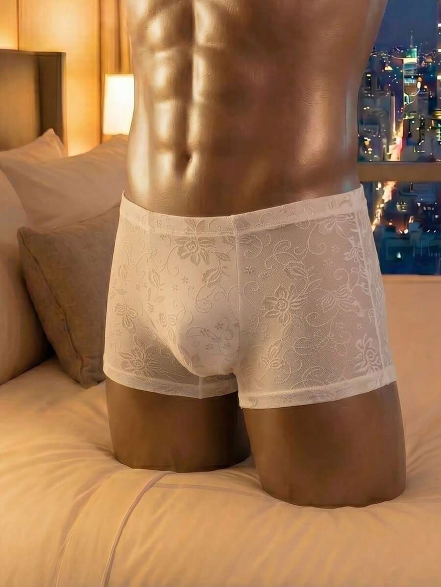 Men's white low rise mesh boxer briefs featuring a plant pattern and rib-knit details