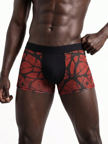 Rest Era men's red semi-sheer mesh boxer briefs with geometric spider web pattern, contrast binding, and mid-rise waist.