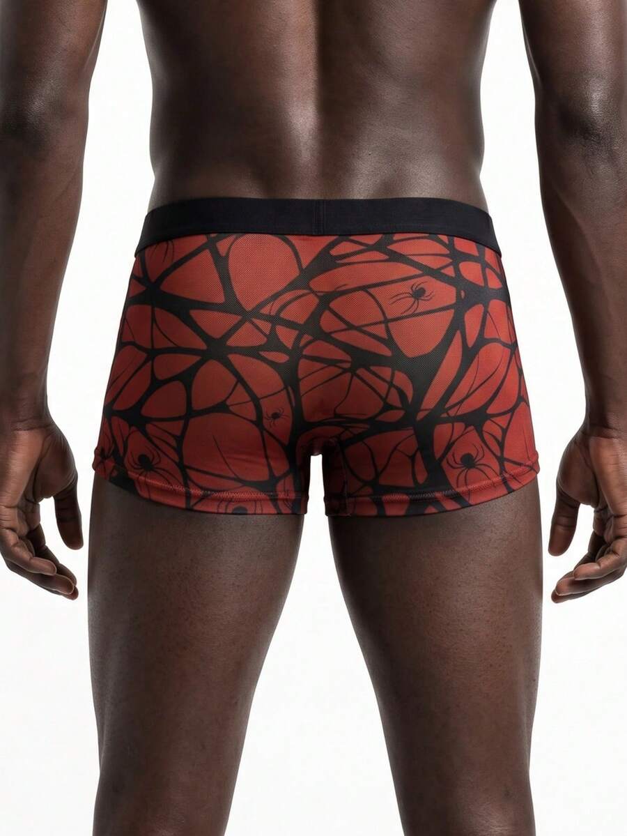 Rest Era men's red semi-sheer mesh boxer briefs with geometric spider web pattern, contrast binding, and mid-rise waist.