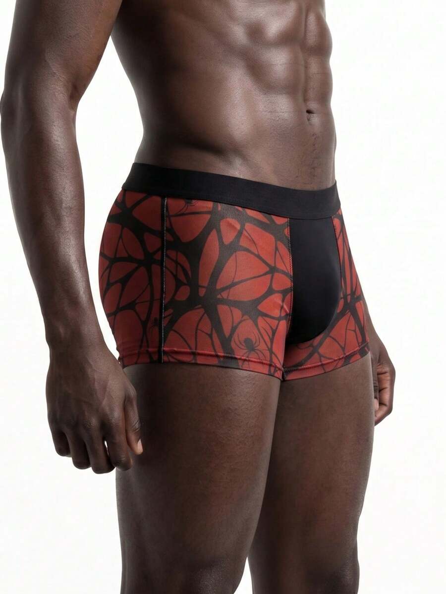 Rest Era men's red semi-sheer mesh boxer briefs with geometric spider web pattern, contrast binding, and mid-rise waist.