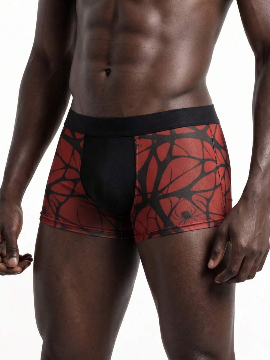 Rest Era men's red semi-sheer mesh boxer briefs with geometric spider web pattern, contrast binding, and mid-rise waist.
