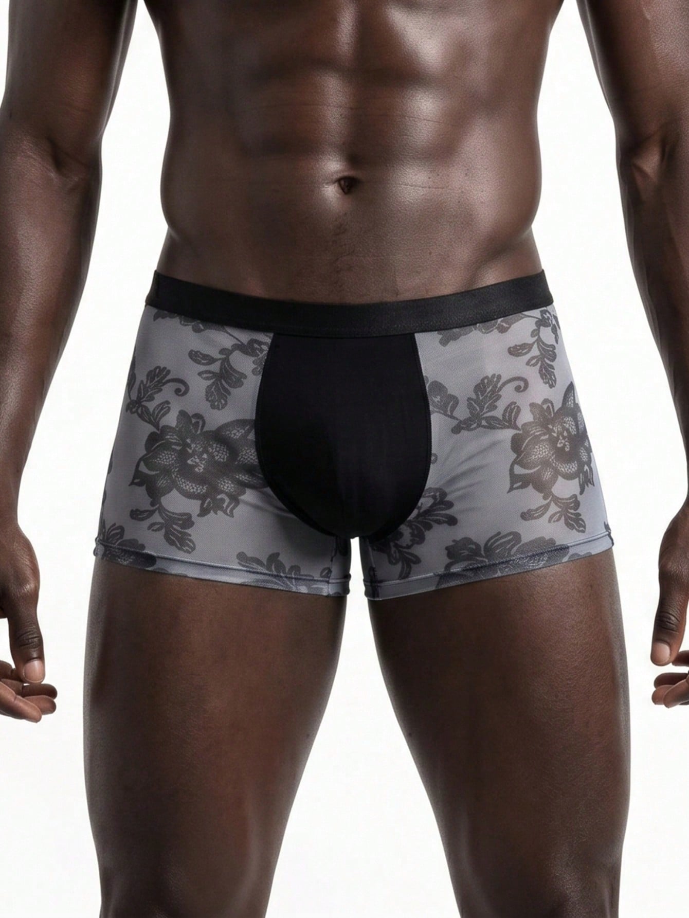 Rest Era men's grey semi-sheer mesh boxer briefs featuring a low rise fit, contrast binding, and plant pattern.