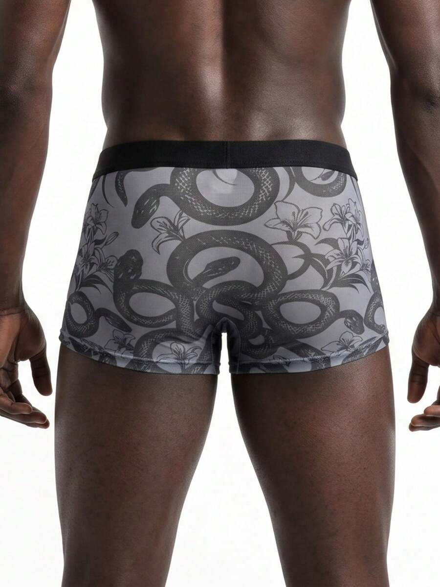 Rest Era men's grey semi-sheer mesh boxer briefs featuring a low rise fit, contrast binding, and plant pattern.