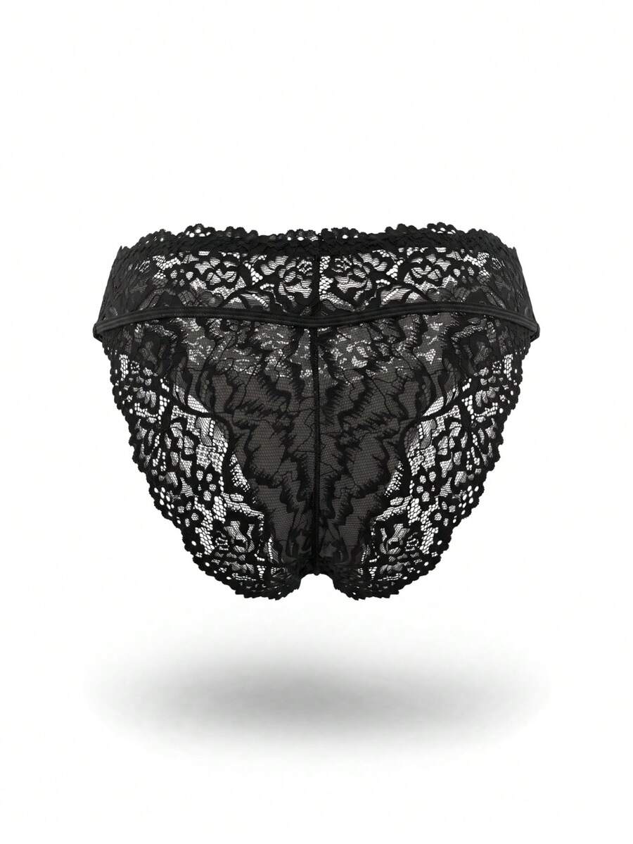 Black men's lace patchwork briefs featuring contrast binding and a mid-rise waist.