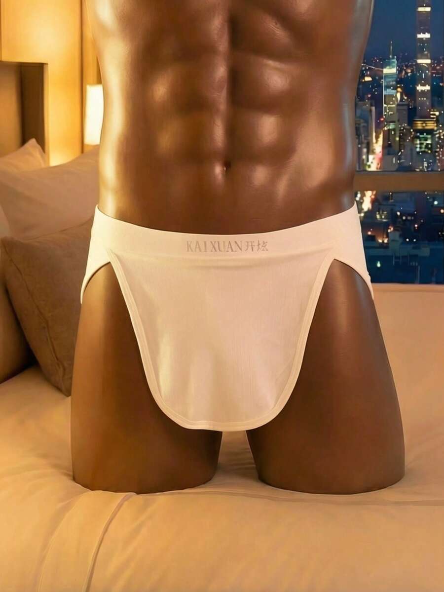 Men's plain white shiny low rise flat boxer shorts.