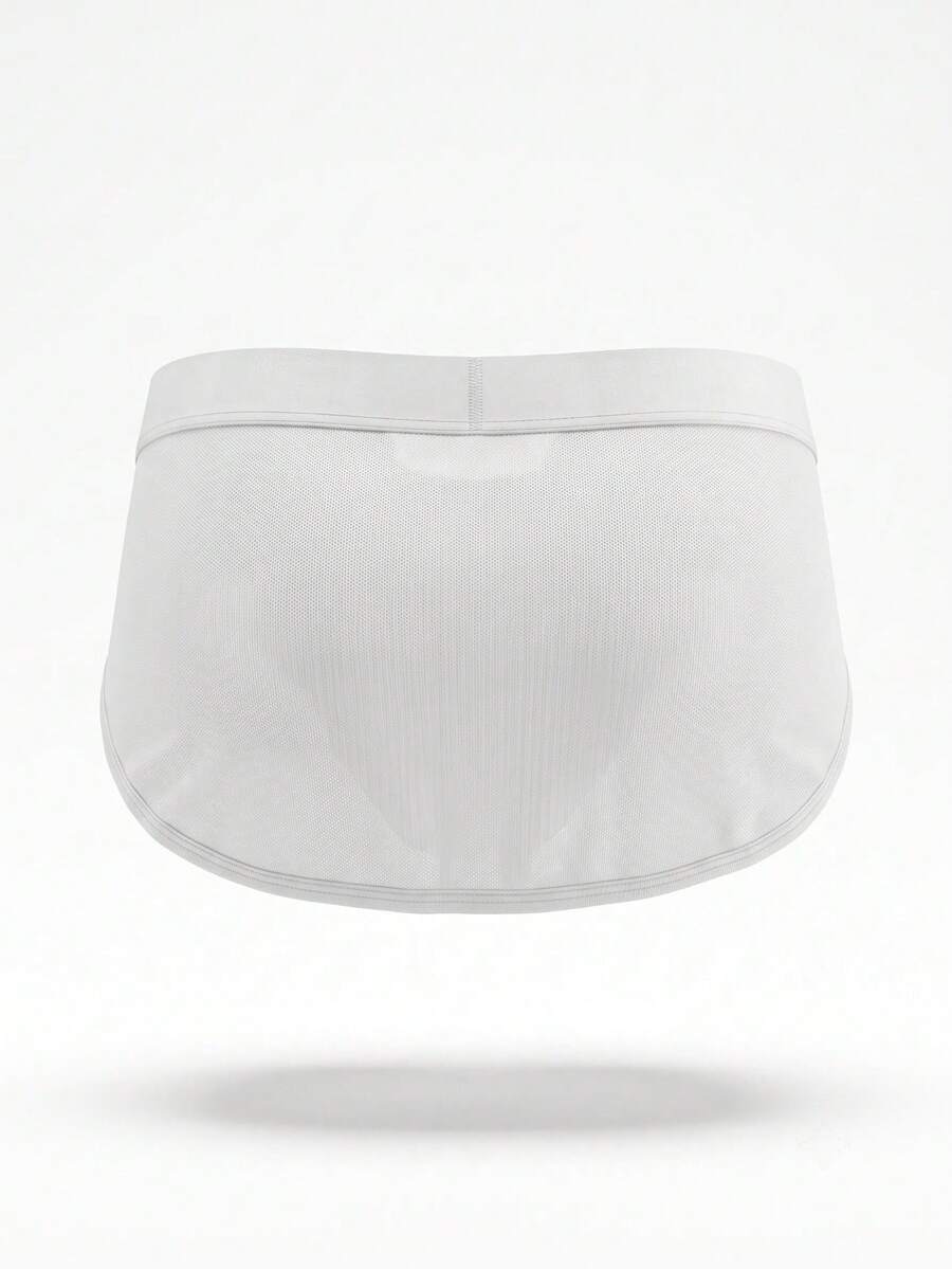 Men's plain white shiny low rise flat boxer shorts.