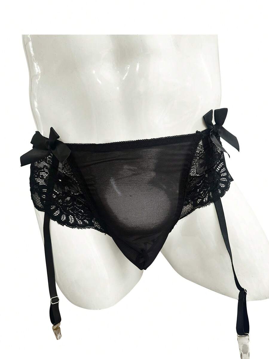 Black men's low waist lace contrast mesh garter style boxer shorts featuring medium stretch fabric and plain pattern.