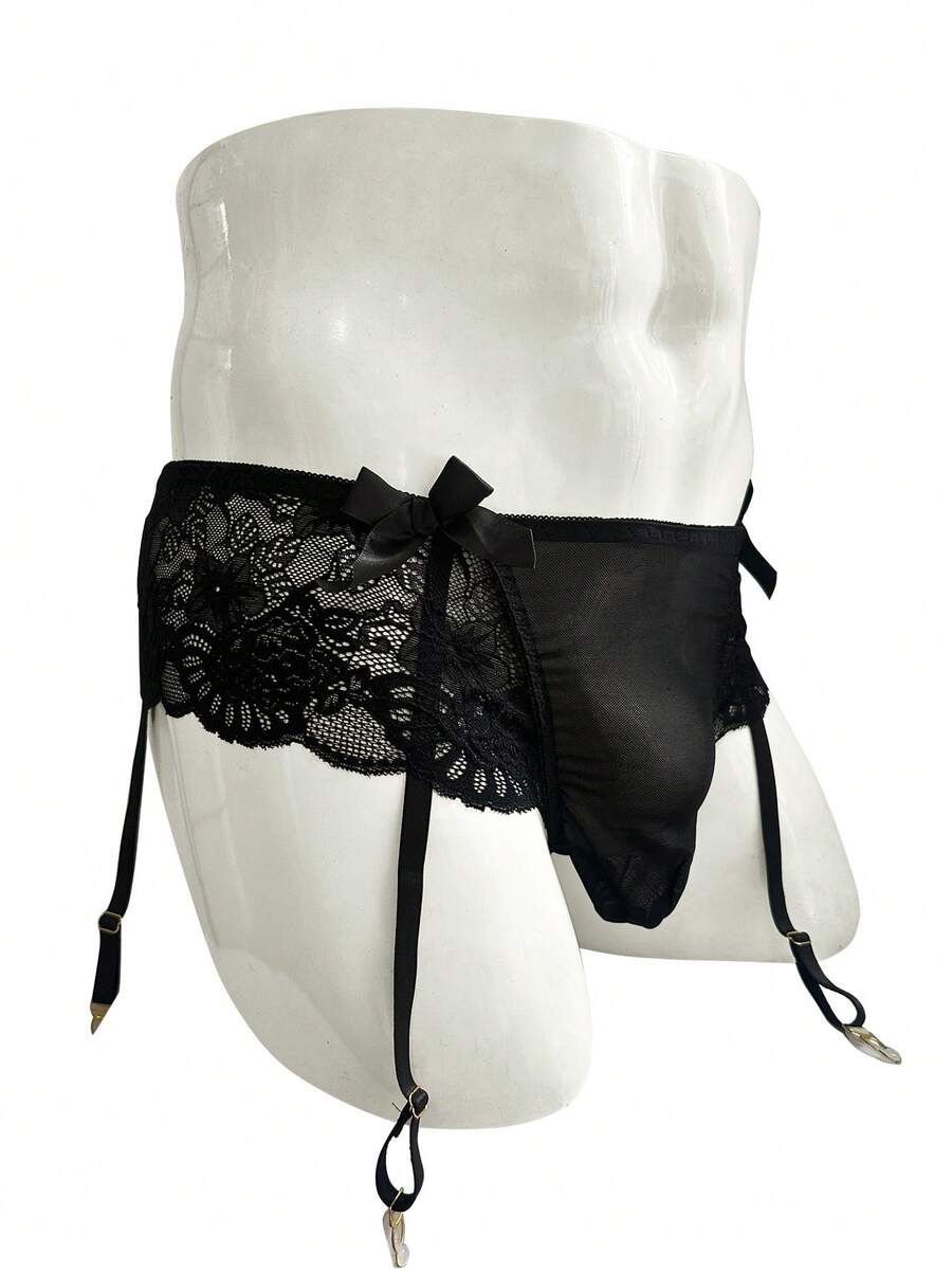 Black men's low waist lace contrast mesh garter style boxer shorts featuring medium stretch fabric and plain pattern.