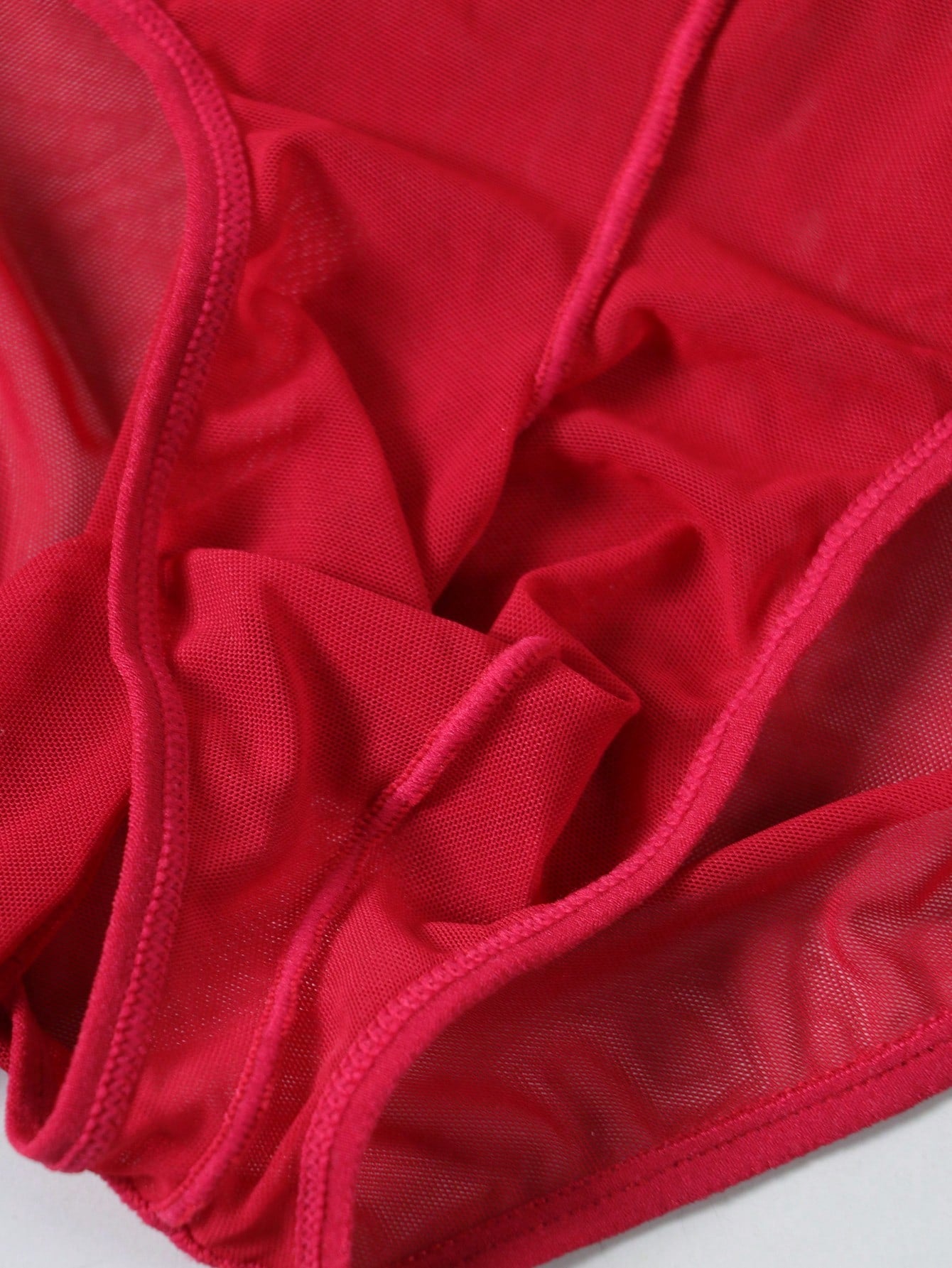 Solid Color Semi Transparent Mesh Triangle Briefs For Men